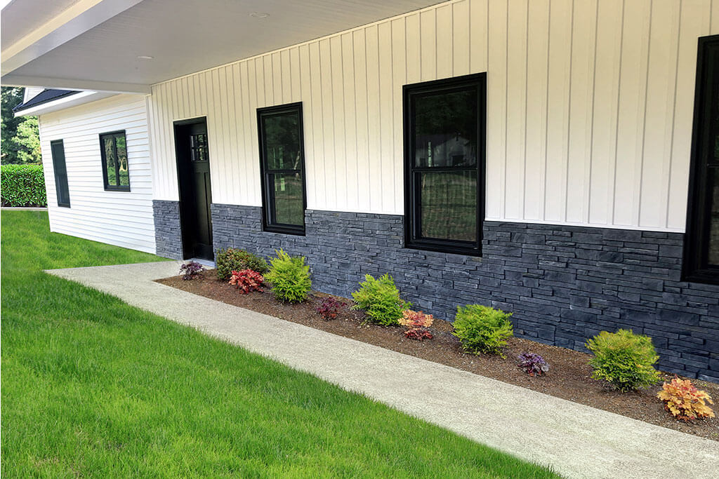 Stone veneer siding, skillfully installed by knowledgeable siding professionals in Woodstock, Ontario